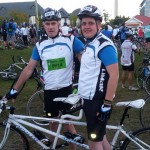 tandem cycling with his dad